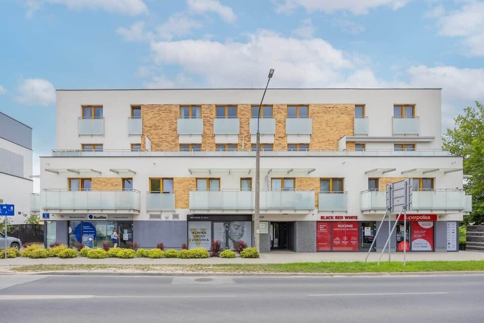 A modern building with spacious balconies ensures comfort and easy access to local amenities.