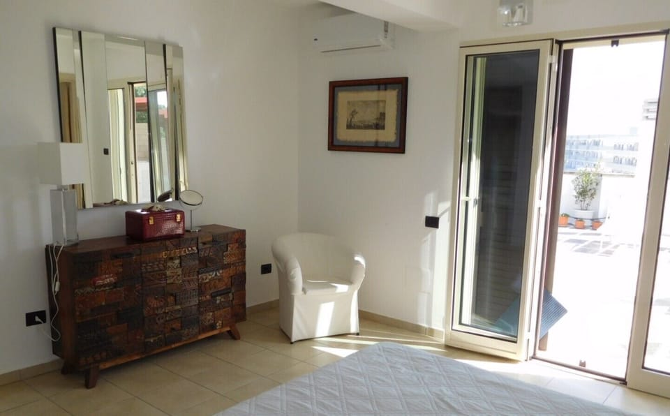 Apartment, Sea View | Living area | 32-inch flat-screen TV with cable channels