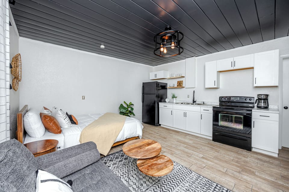 Cozy studio with modern kitchen and open living space.