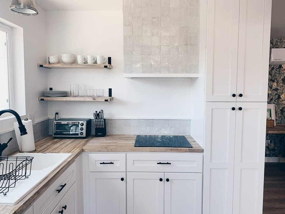 Prepare delicious meals in your fully equipped kitchen, designed for your culinary convenience.