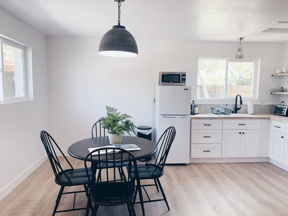 Enjoy meals in the spacious dining area, perfect for gatherings and relaxation.