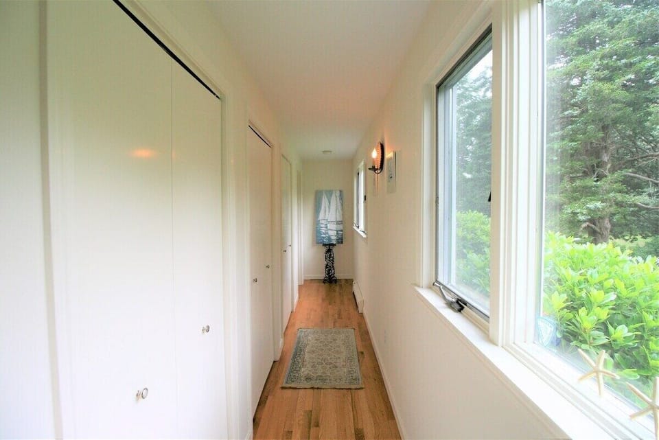 Hall to private Main Level Primary Suite