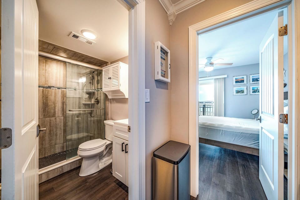 View from full bathroom and queen sized bedroom
