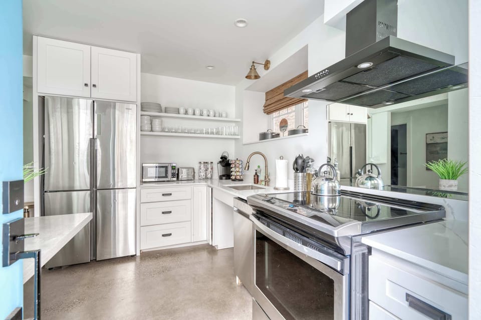Kitchen 2 with island and stainless appliances.