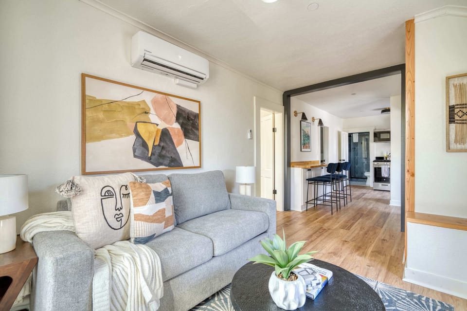 Living room opens to Bedroom 2