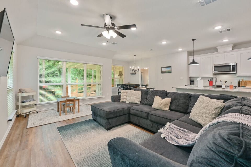 Seamless flow from kitchen to living room for effortless living.