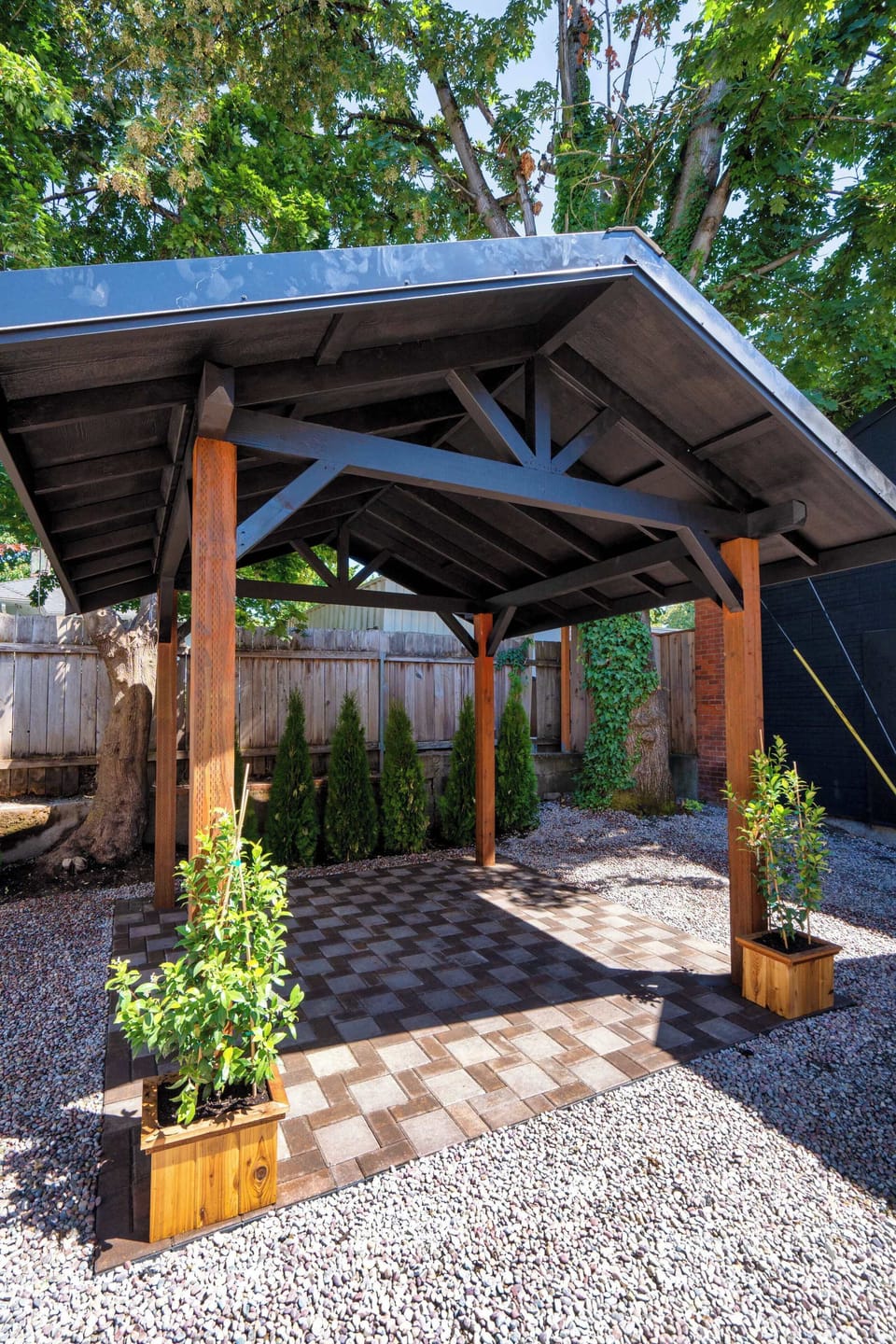 Covered backyard seating area.