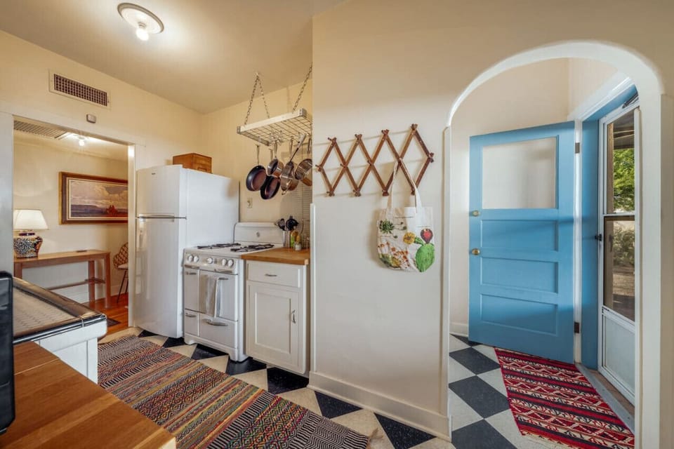 Well-appointed kitchen (no dishwasher) and access to lovely private patio