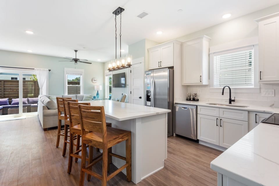 Whip up something delicious in the Kitchen with modern appliances and snack at the counter bar!