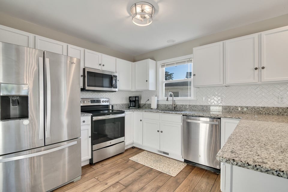 Whip up something delicious in the fully-equipped Kitchen with modern amenities and appliances!