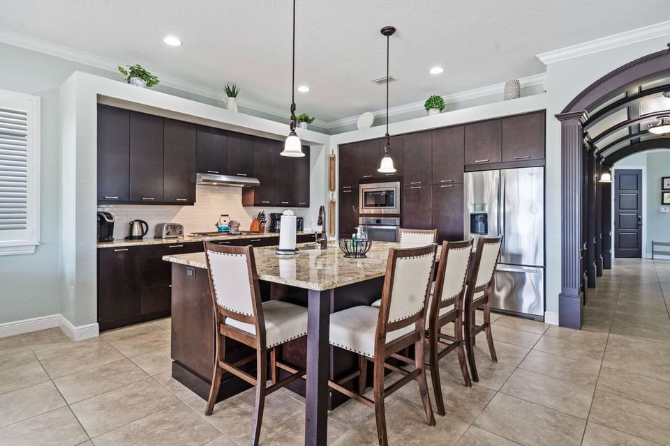 Large kitchen island is perfect for group meals and snacks.