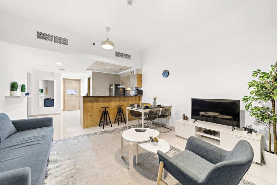 Living Room: Bright, modern space with sleek furniture and a welcoming vibe for unforgettable moments!