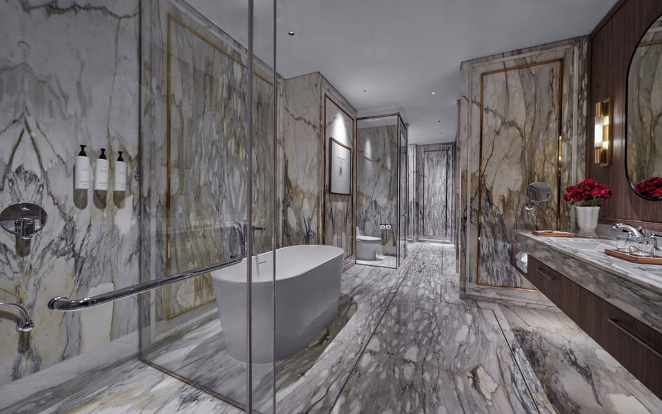Presidential Suite, 1 King Bed | Bathroom | Hair dryer, bathrobes, slippers, towels