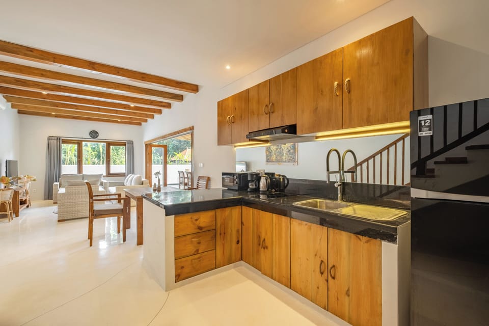 Deluxe Villa, 3 Bedrooms | Private kitchen | Fridge, microwave, stovetop, coffee/tea maker