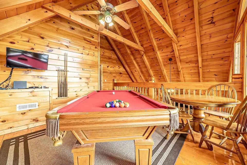 Challenge friends to a pool match in this stunning wood-beamed retreat!