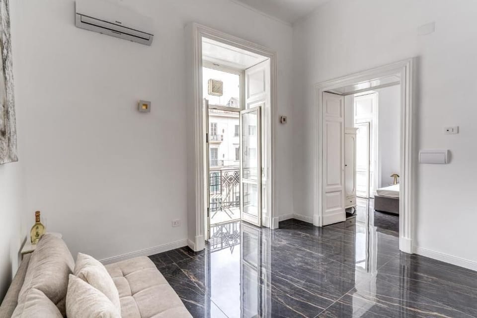 Deluxe Apartment, 1 King Bed with Sofa bed | Living area | 48-inch flat-screen TV with satellite channels, Netflix