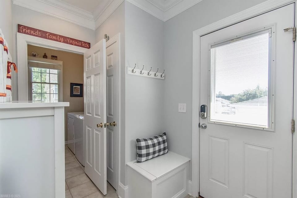 back door is the main entry for guests, and onset laundry room