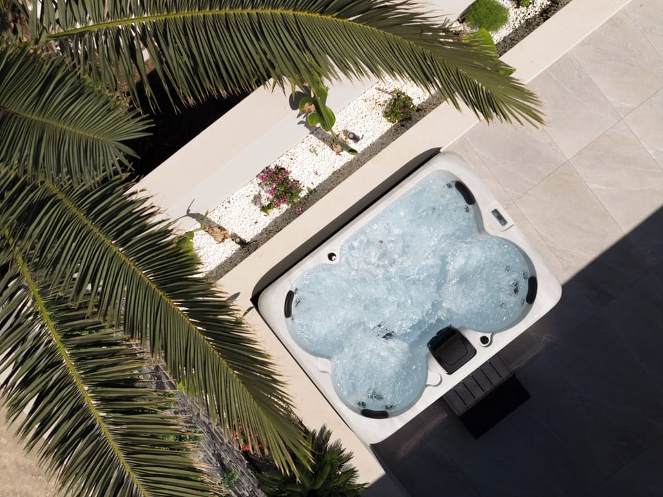 Relax and unwind in the luxurious 4-seater Spa Whirlpool.