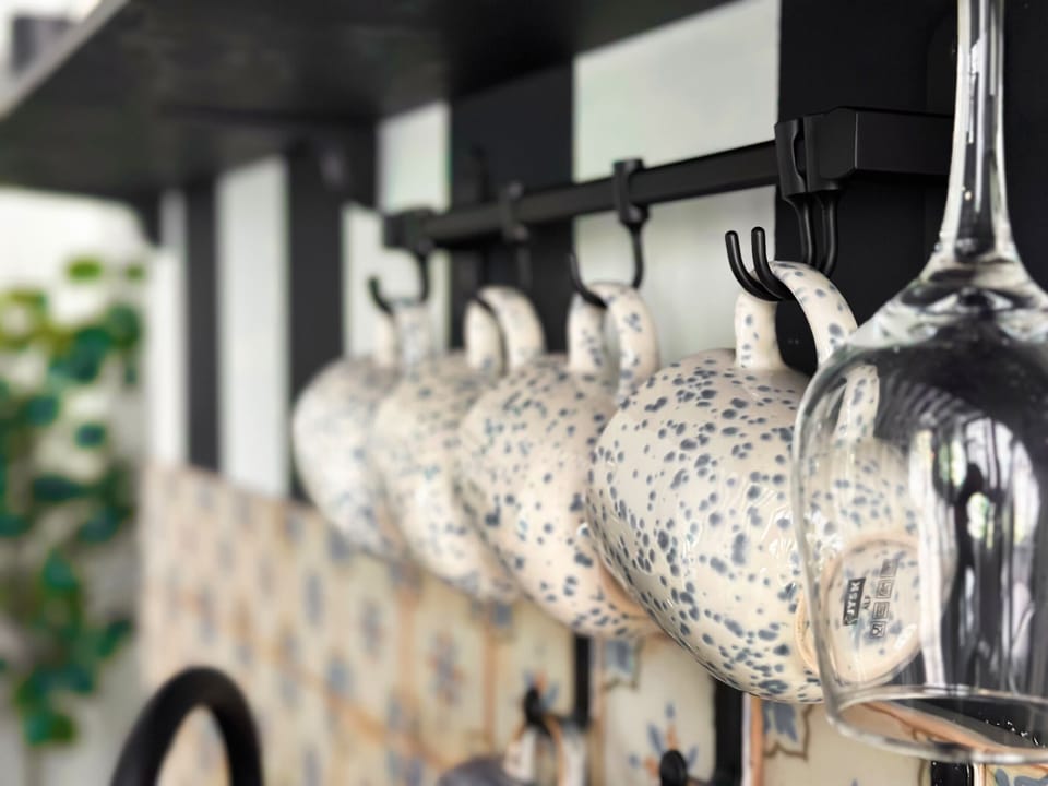 Sip in Style: Enjoy your drinks in unique Mediterranean-style coffee cups and wine glasses, adding a touch of elegance and charm to your beverage experience.