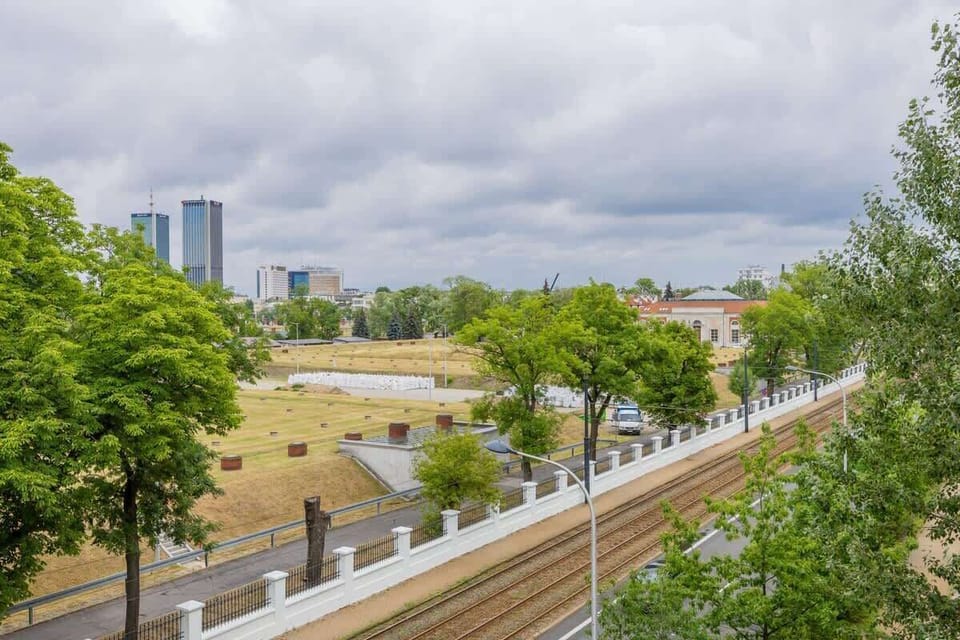 A view of the city skyline with green alleys lets you feel the energy and atmosphere of the metropolis.