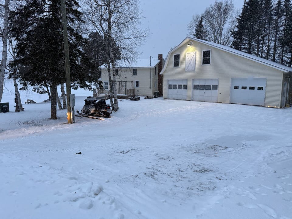 Plenty of room for parking.  Garage available to park snowmobiles overnight.