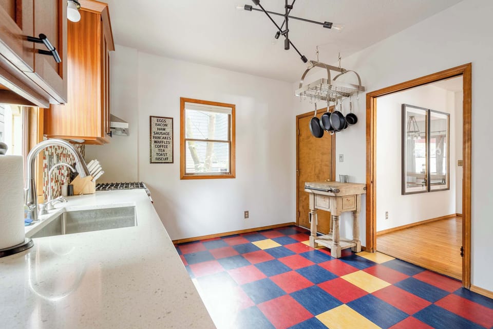Kitchen prep area and side entry.