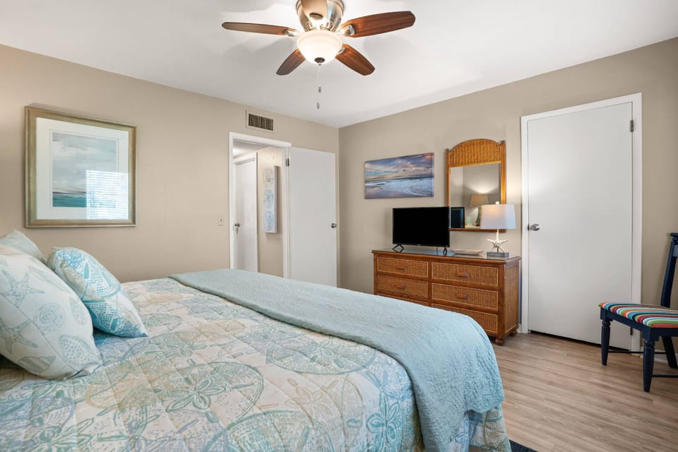 One of the bedrooms upstairs with a spacious King bed