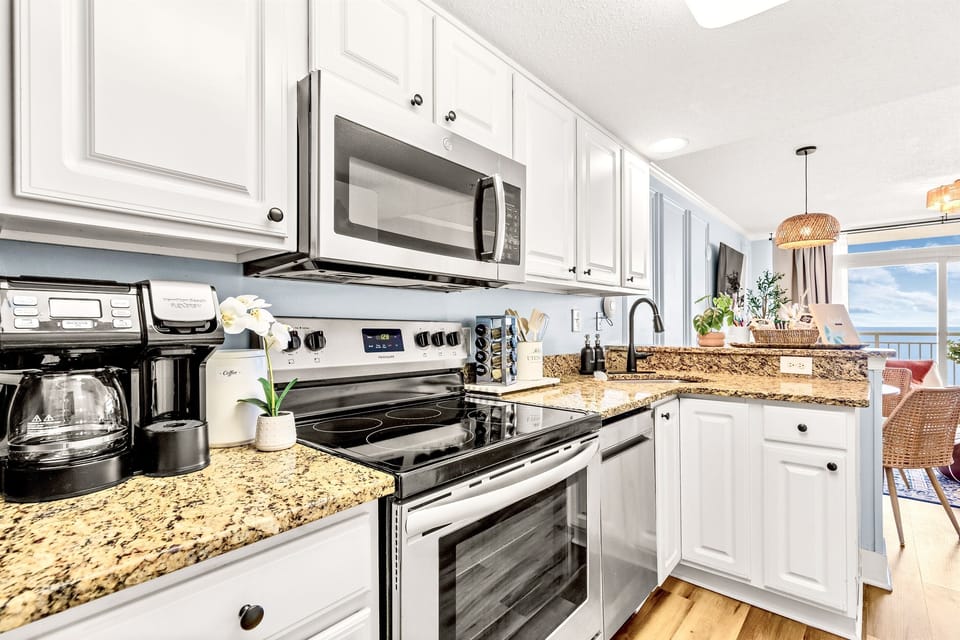 Full amenity kitchen with a coffee station