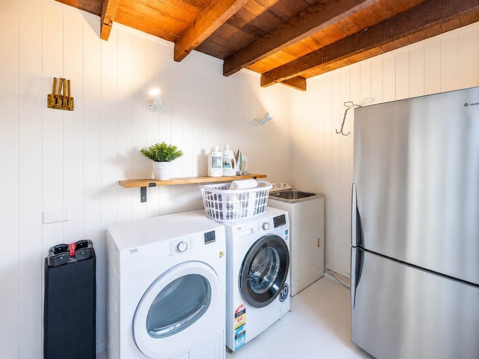 Laundry Room under the House with bathroom downstairs bedrooms. Externally accessed.