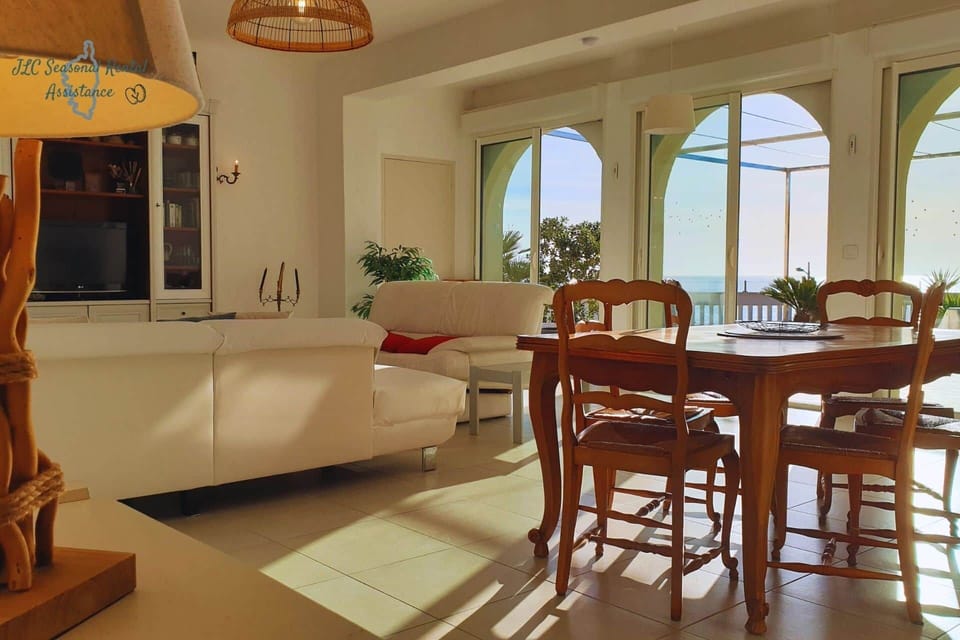 Spacious living area open to the sea