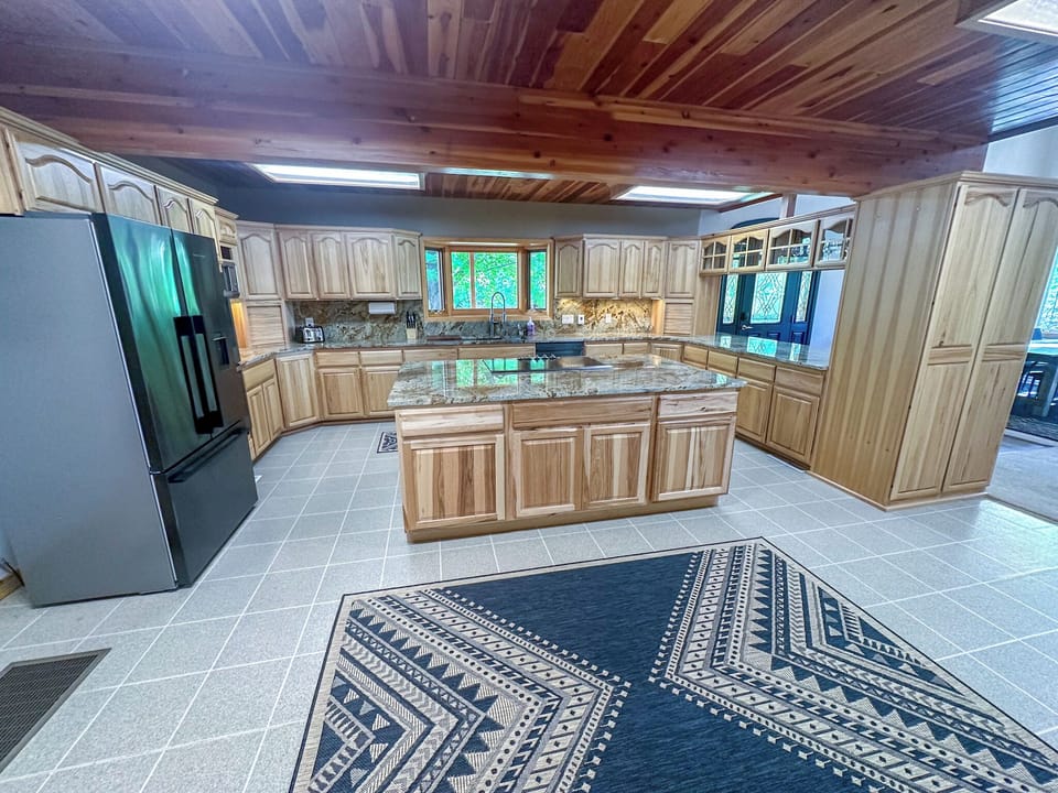 Beautiful kitchen with huge island and high end appliances