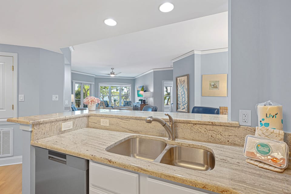 An open layout create a seamless connection to the dining and living areas allows everyone to stay part of the conversation.