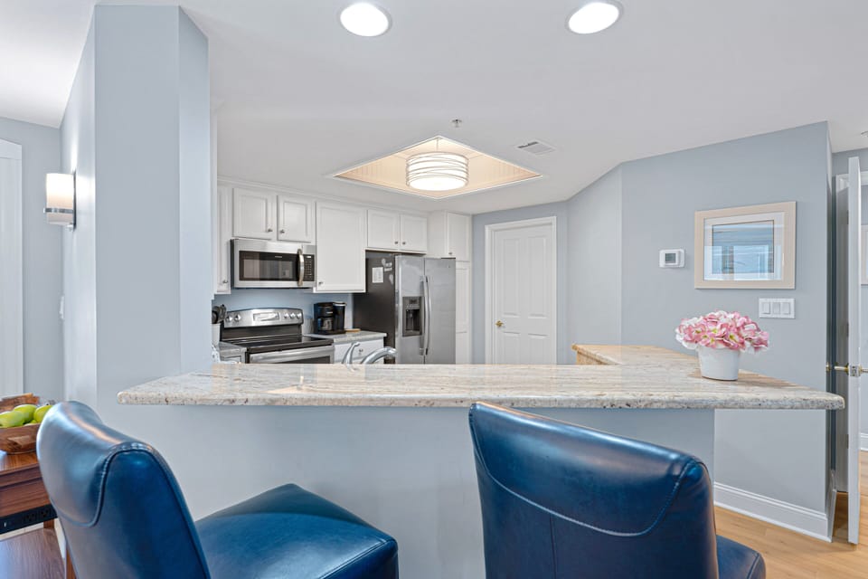 The open sightlines to the dining area keep everyone connected during meals and gatherings.