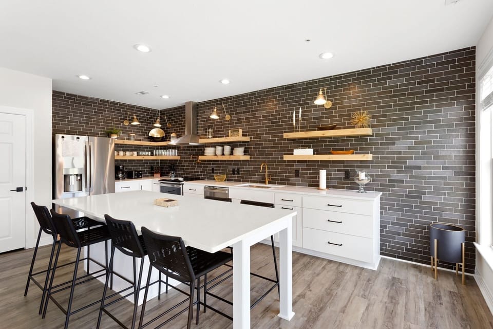 Whip up something delicious in the modern Kitchen and have a snack at the counter bar.
