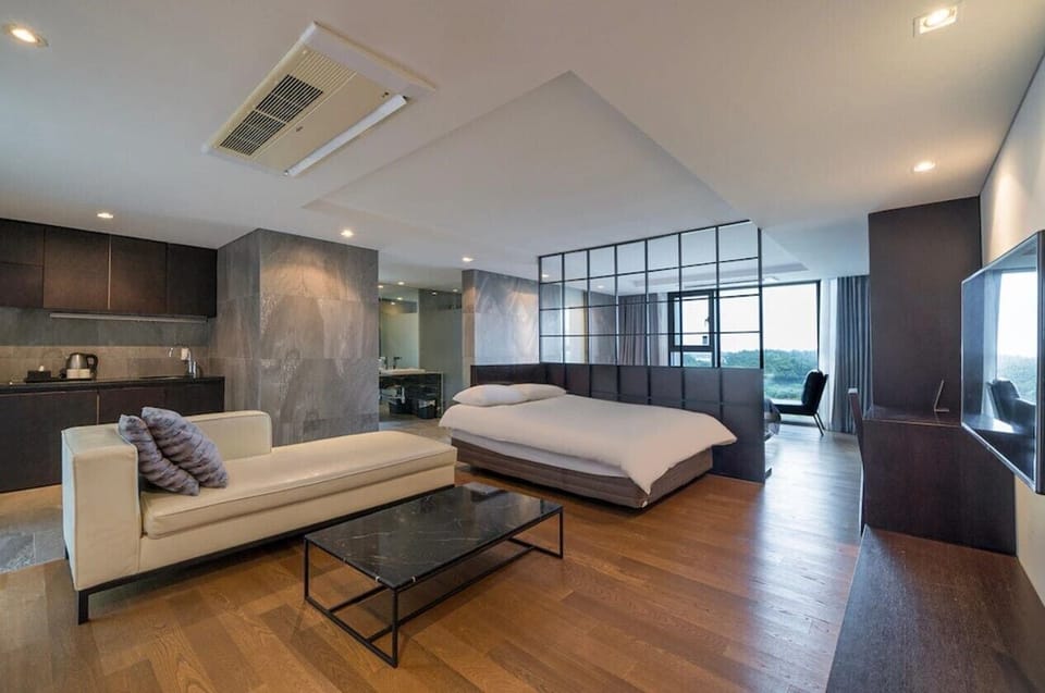 Premium bedding, blackout drapes, soundproofing, free WiFi