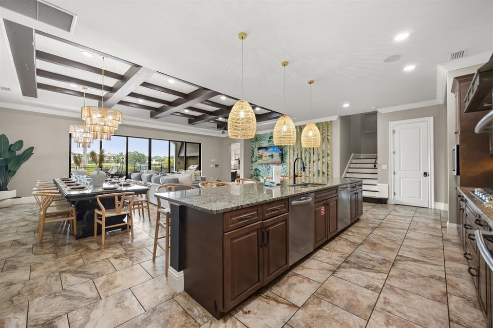 A fully equipped kitchen with breakfast bar