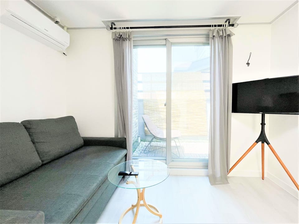 Deluxe Triple Room, Multiple Beds, Non Smoking, City View (Self Check-In, non-Korean nationals only) | Individually decorated, individually furnished, desk, laptop workspace
