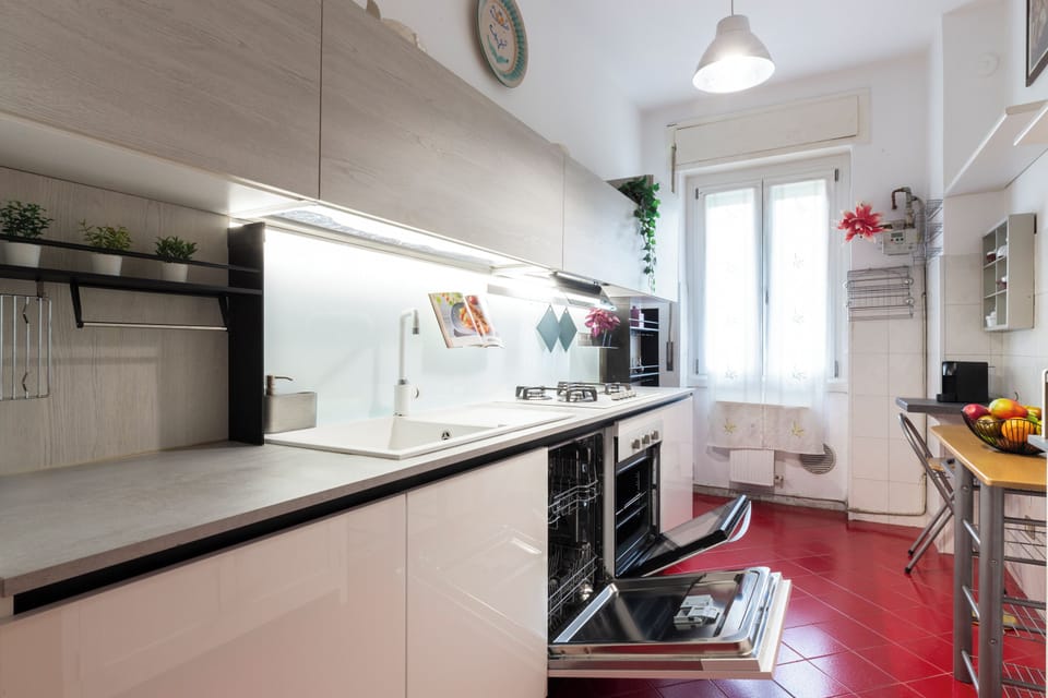 Comfort Apartment | Private kitchen | Full-size fridge, oven, stovetop, dishwasher
