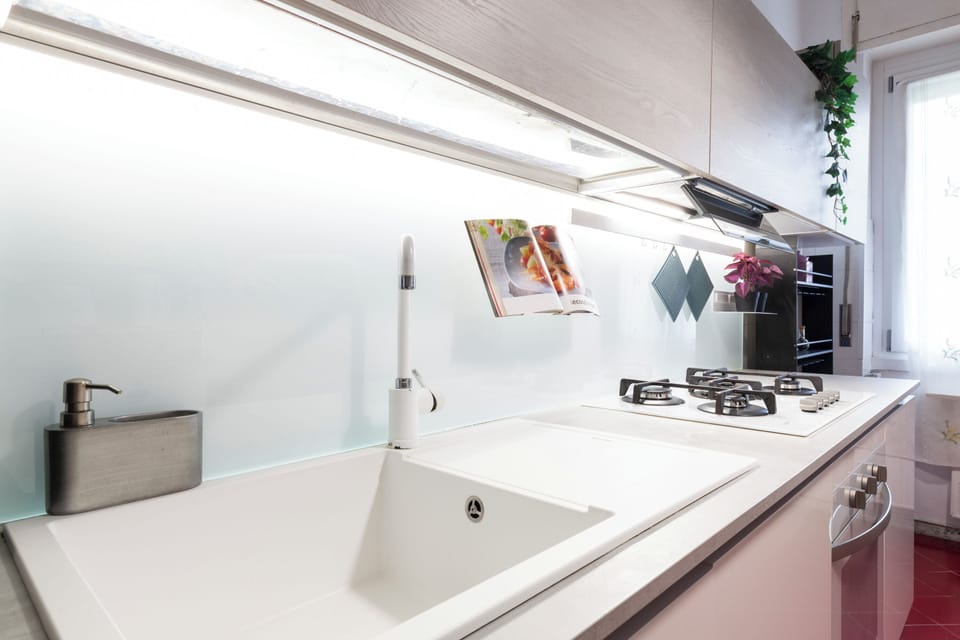 Comfort Apartment | Private kitchen | Full-size fridge, oven, stovetop, dishwasher