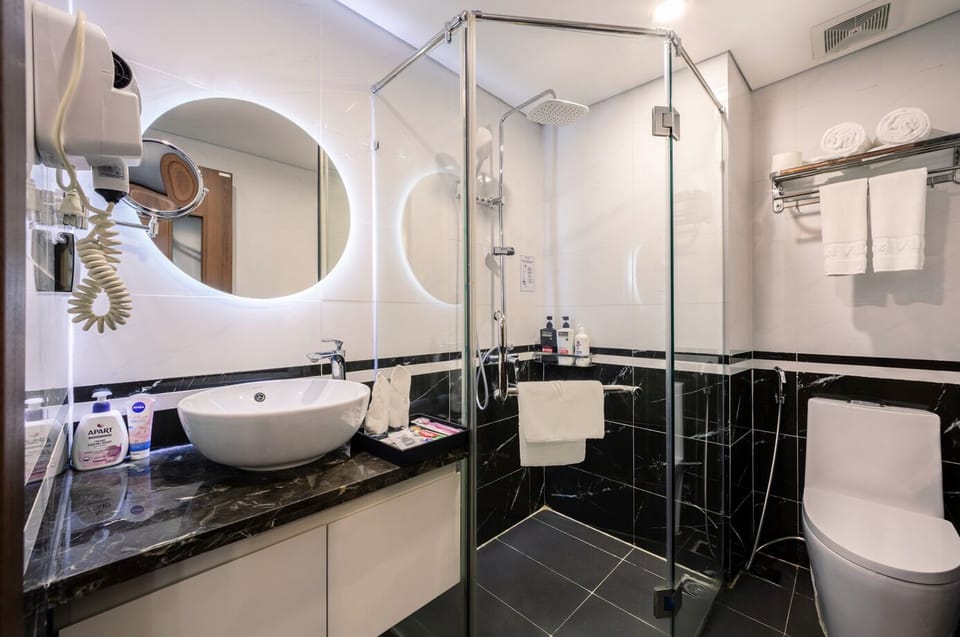 Family Room | Bathroom | Shower, hair dryer, bathrobes, slippers