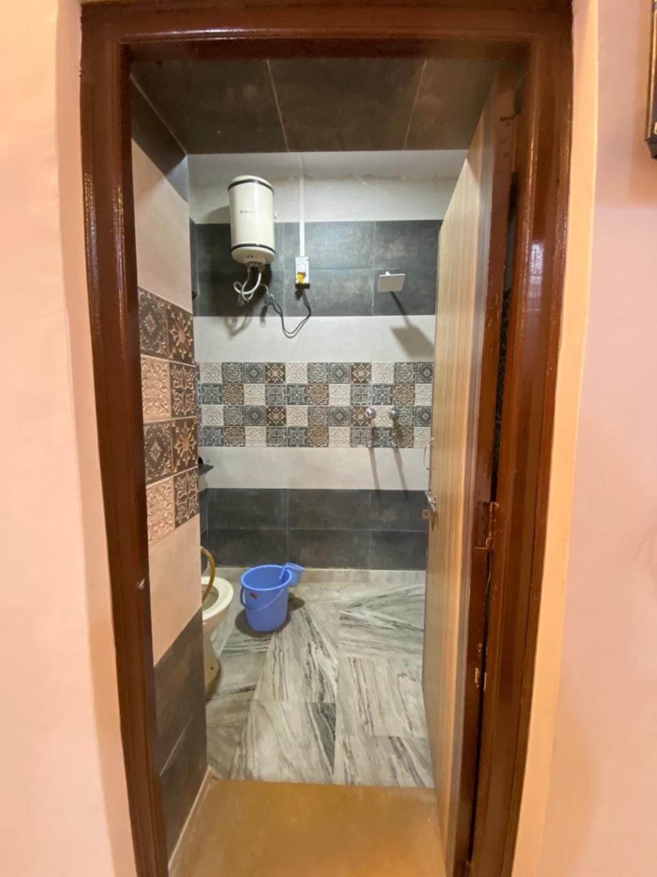 Shower, towels, soap, toilet paper