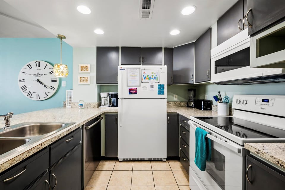 Fully stocked and ready for your stay—cook, reheat, or just chill the drinks.
Whether you’re prepping snacks or pouring wine, enjoy great conversation and great views from here.



