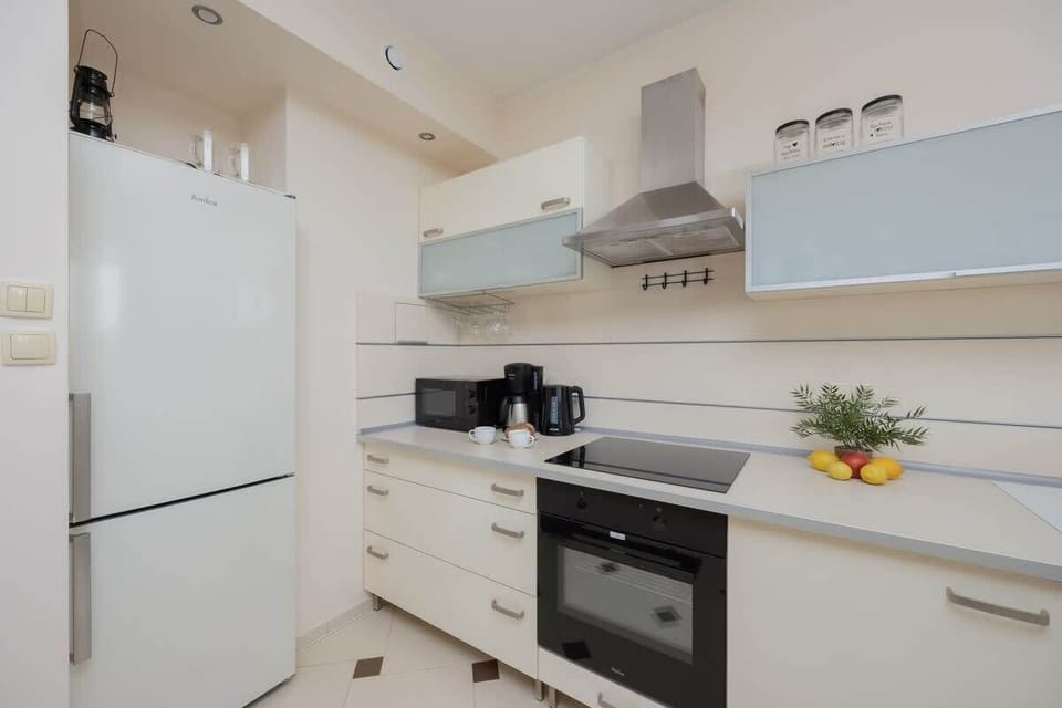 The fully equipped kitchenette includes everything you need for a home-cooked meal.