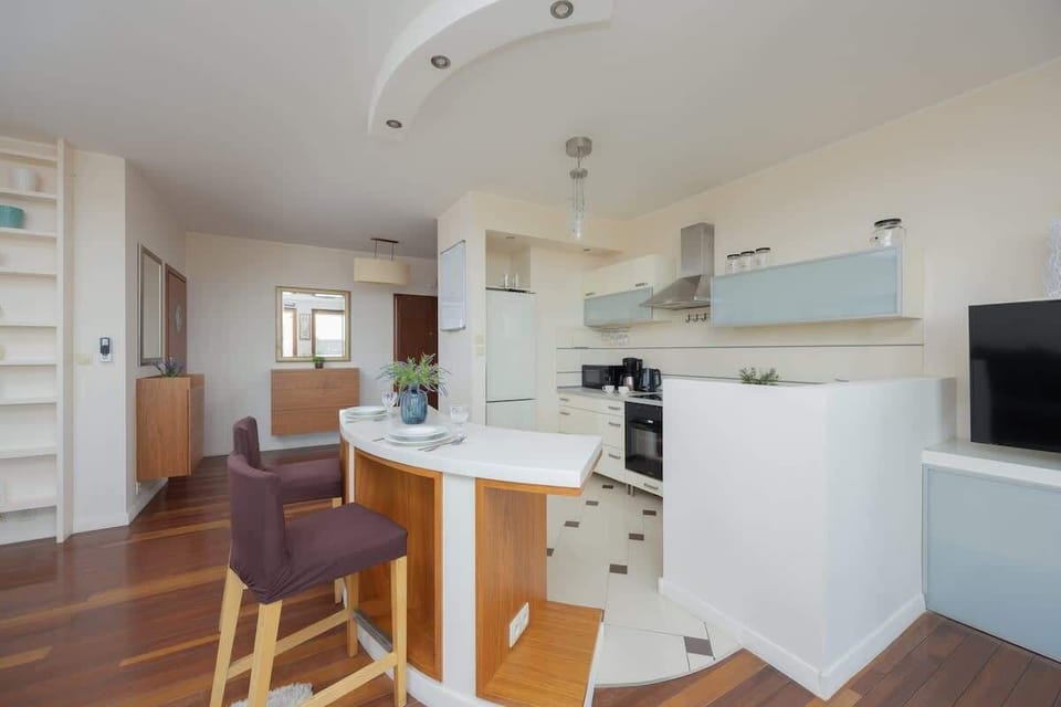 The kitchenette's practical layout maximizes space and functionality.