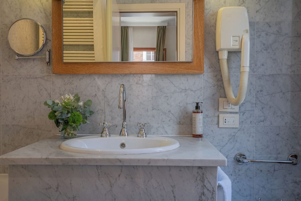 Bathtub, free toiletries, hair dryer, slippers