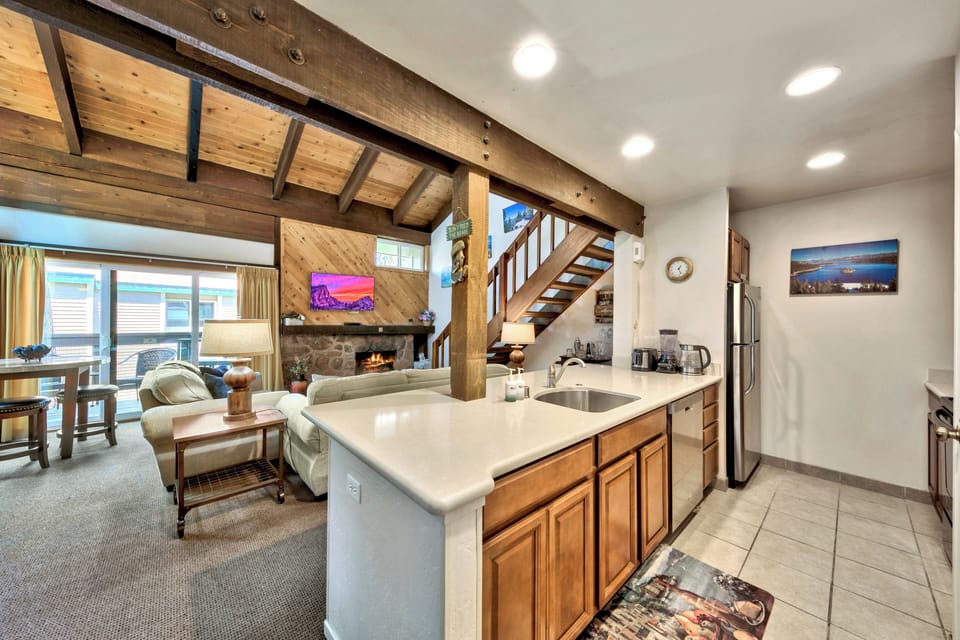 The kitchen has been updated with modern appliances for crafting family meals