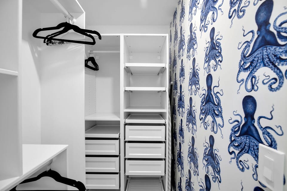 Make yourself at home in this spacious walk-in closet!