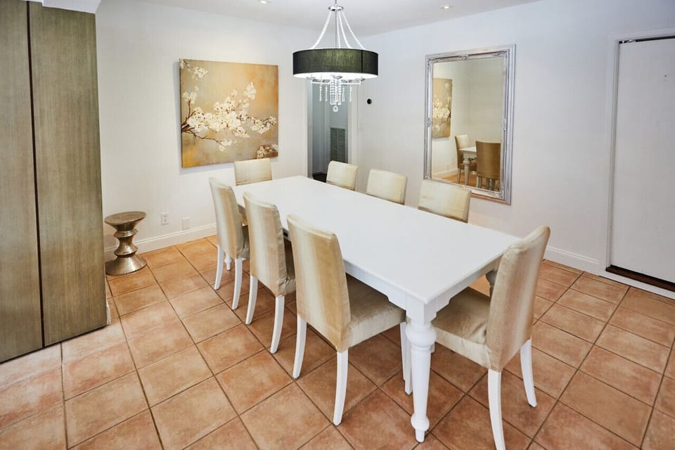 Comfortable seating for 8 just off of the kitchen in the open floor plan.