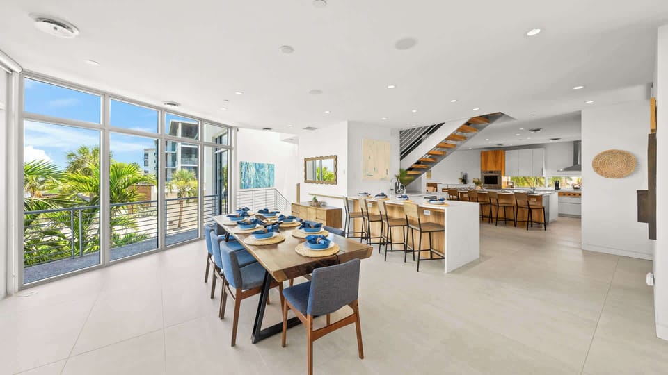Great Room - Dining Area w/ Bar Seating for 12 - Electric Fireplace - Large Smart TV - Balcony Access - Waterfront - Direct Gulf Views