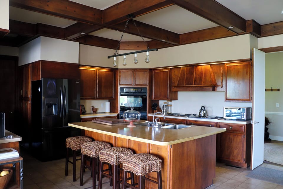 Full kitchen - double ovens,  cook top, toaster oven, coffee maker/ grinder